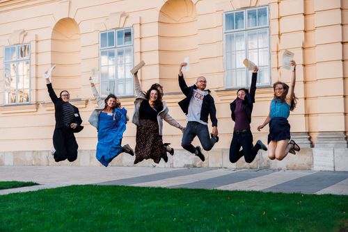 Photo of returning Austrian Fulbright grantees jumping
