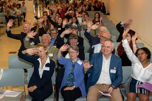 Photo of attendees waving at the 2022 SummerFest