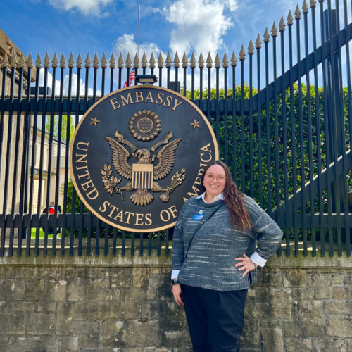 Anjolina standing outside the US embassy in Luxembourg